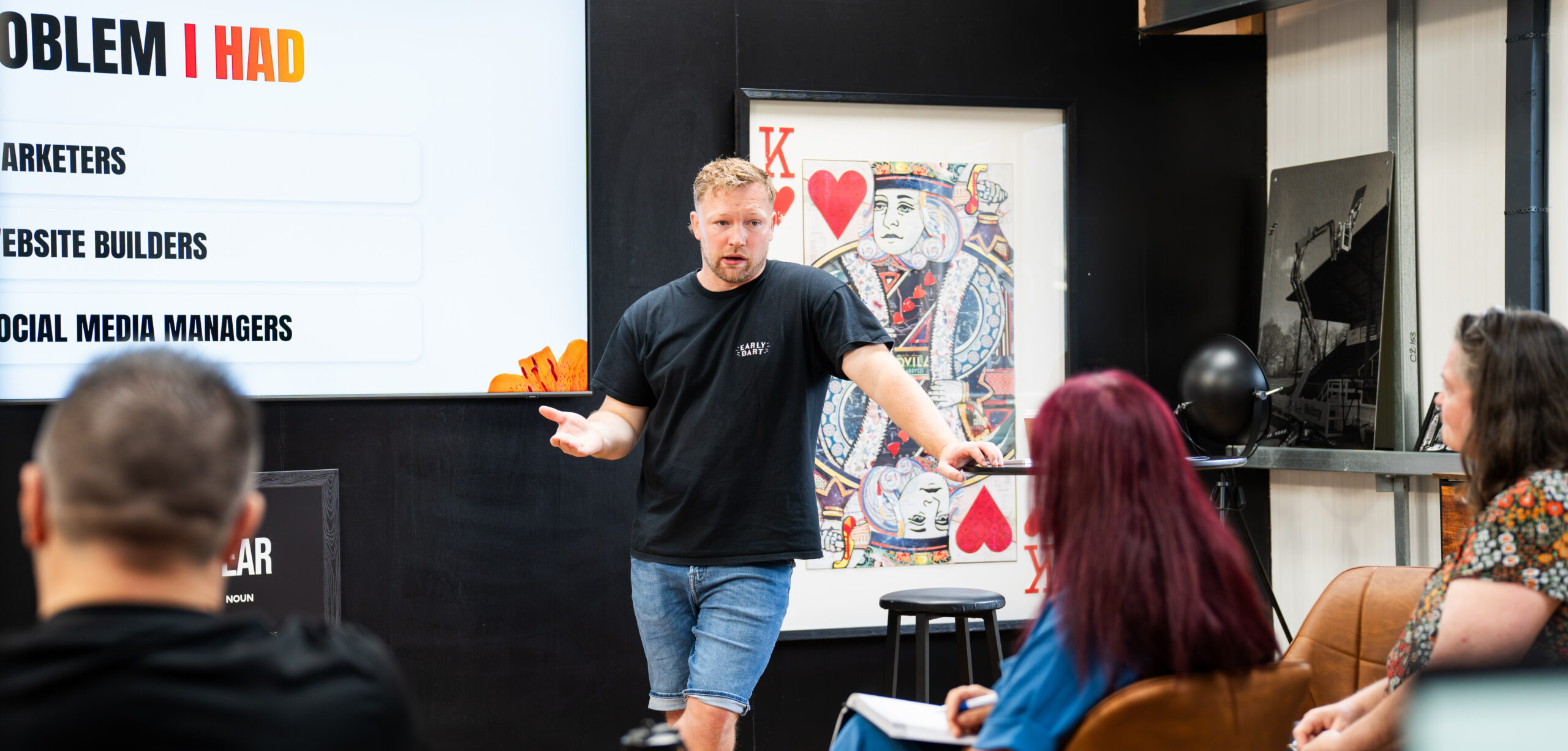Bud teaching an Early Dart session in front of the screen